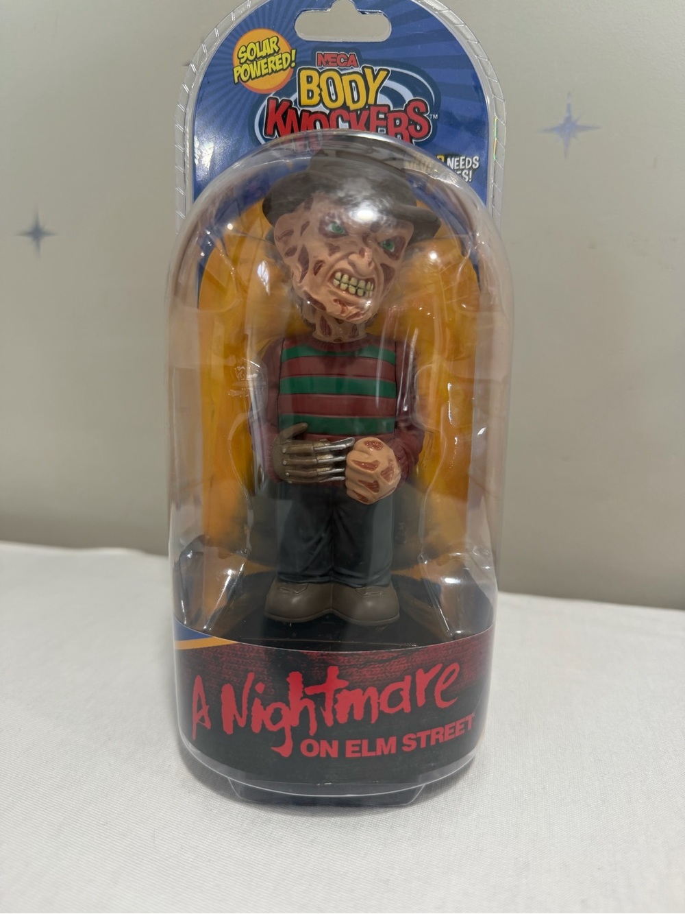 NECA Body Knocker - Freddy-Inspired Horror Figurine in Green & Red